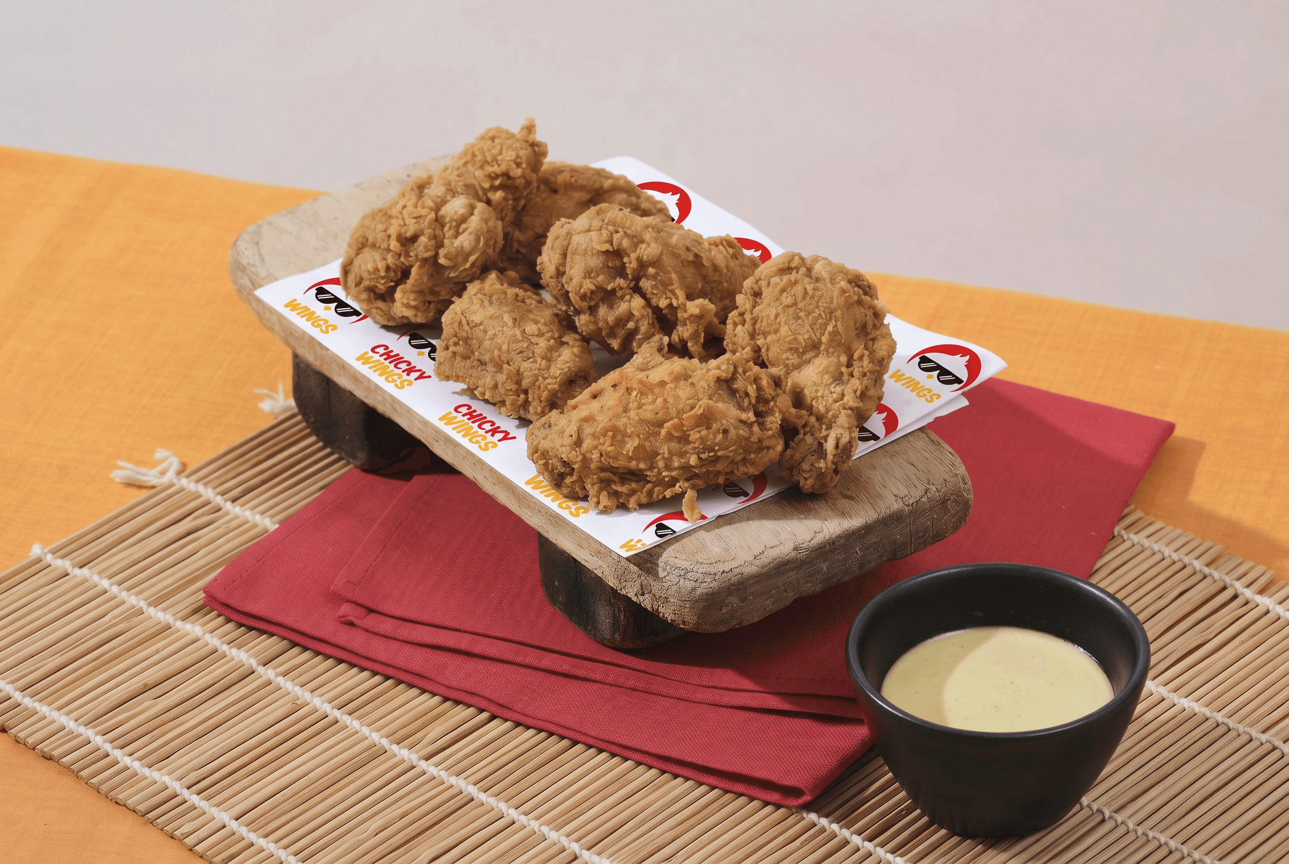 Chicky Wings signature delivery dish.